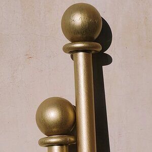 Gently worn brushed gold painted metal curtain rod 10.5 ft